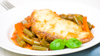 white fish fillet with vegetables