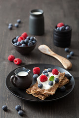 crisp bread with creme fraiche and berries