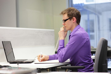 correct sitting position - man working in the office