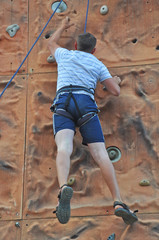 Men on rock wall - climbing - obrazy, fototapety, plakaty