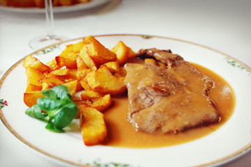 Steak with sauce on a plate