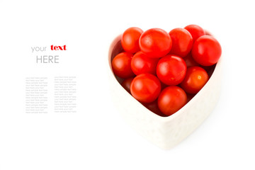 Naklejka na ściany i meble fresh tomatos in a heart shape with a simple text