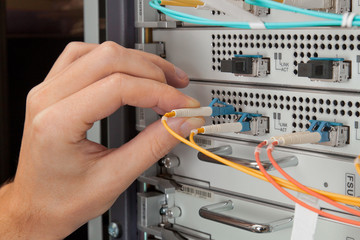 Network engineer insert patch cord