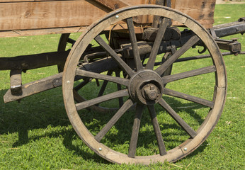 Fototapeta na wymiar old wooden wheel
