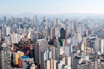 Aerial view of Sao Paulo city. Cityscape and buildings in sunny day. 
