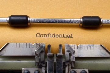 Confidential text on typewriter