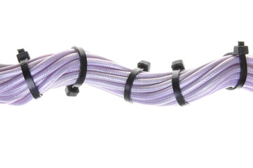Violet Electrical cables with cable ties on white background