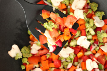 Vegetable ragout in wok, close up