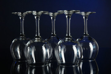 Glasses on dark blue background