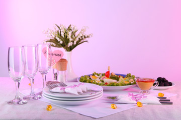 Table setting on yellow background