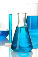 Test tubes with colorful liquids isolated on white