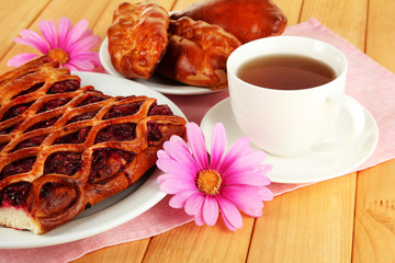 Cherry Pie with tea on table close-up