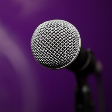 Microphone closeup on blurred background