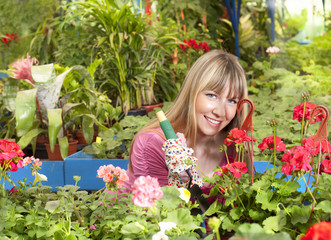 beautiful girl in a greenhouse