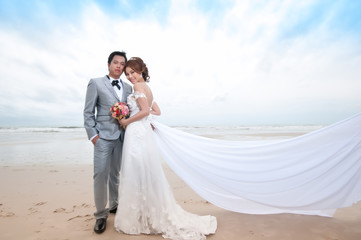 Fototapeta na wymiar groom and bride embrace