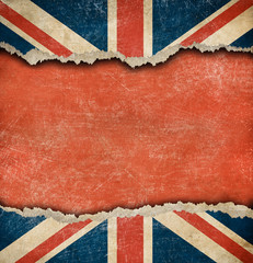 Fototapeta premium Grunge British flag on ripped paper with big empty space