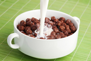 Breakfast cereals, chocolate balls with milk