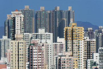 Fototapeta na wymiar Crowded Residential buildings in Hong Kong