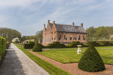 Fototapeta na wymiar Garden and the old dutch mansion Menkemaborg