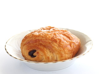 Chocolate croissant isolated on white background
