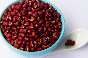 red bean in a small bowl with white spoon