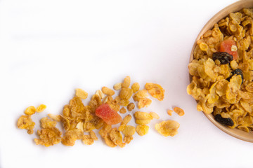 Cereal with dried fruit in a small bowl