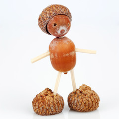 Figure made of acorns and matches