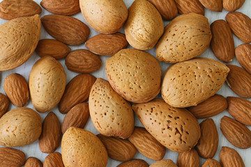 Almonds with and without shell, close up