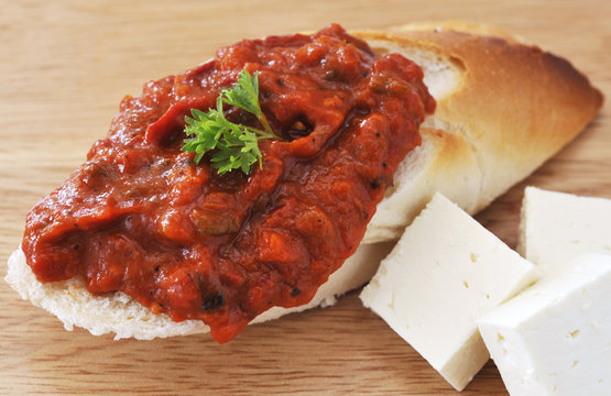 Bulgarian Chutney On Bread And Feta Cheese.