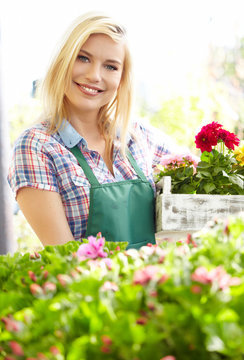 Woman Working In Garden Center