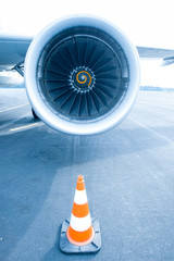 Jet engine with traffic cone in front