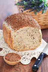 Homemade bread with flax seeds and rye bran, selective focus