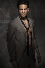 Serious smart man without shirt