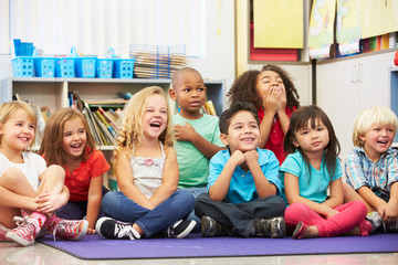 Group of Elementary Pupils In Classroom