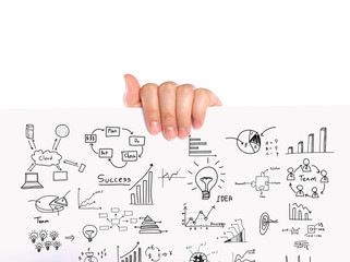 Hand hold Business concept and graph drawing on white paper