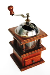 Coffee grinder by hand on a white background