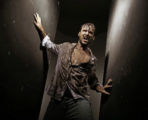 Wounded man after hard survival