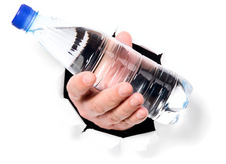 Man is holding bottle through a hole