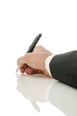 Back view of a hand writing