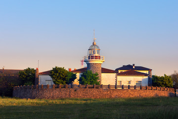 Fototapeta na wymiar lighthouse in Getxo at sunset