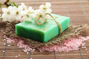 Obraz na płótnie Canvas Natural handmade soap on bamboo mat