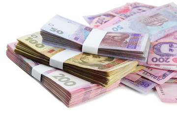Pile of Ukrainian money, isolated on white