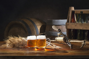 beer still life on the table with old  beer kegs tap