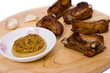 BBQ Ribs on wooden plate