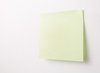 Blank Sticky Note on white wall
