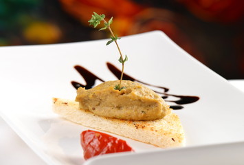 Appetizer Foie gras Pate on toast with balsamic vinegar