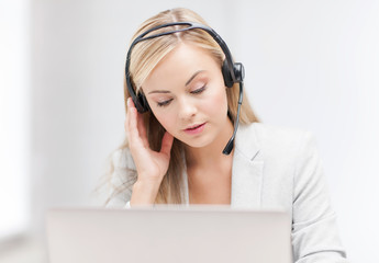 female helpline operator with laptop