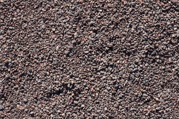 Gravel, pebbles and sand closeup background