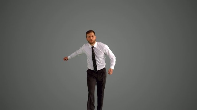 Businessman jumping and clicking heels