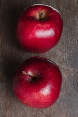 two ripe red apples close up